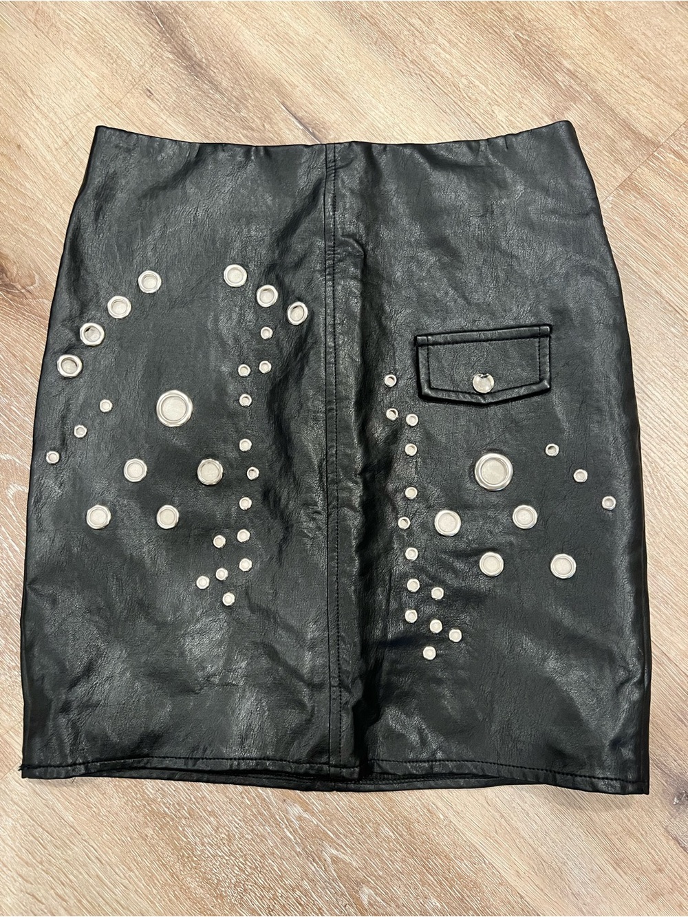 Black Faux Leather Grommet Detail Mini Skirt size 4. Like new.